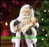 Santa with Baby Jesus figurine