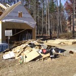A photograph of the trash heap in front of the ongoing home construction next door to me. San's unsecured McDonald's bags. trash next door